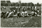 Group of men crawling in the Sheep Meadow