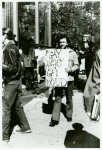 Man with "Gay is Angry, Gay is Proud" sign