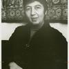 Ros Regelson, seated