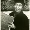Ros Regelson, seated with papers