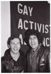 Marc Rubin and friend in front of GAA banner