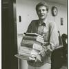 Jack Baker carrying books