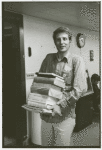 Jack Baker carrying books