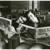Men reading Gay magazine