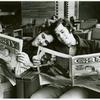 Men reading Gay magazine