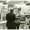 Gittings talking with psychiatrist at the "Gay, Proud and Healthy" display