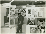 Psychiatrists looking at "Gay Proud and Healthy" display #2