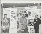 Kameny talking to psychiatrist at "Gay, Proud, and Healthy" display