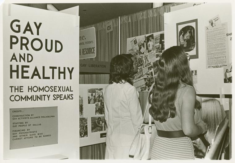 Psychiatrists looking at "Gay, Proud and Healthy" display 3 NYPL