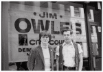 Jim Owles and Morty Manford in front of campaign banner