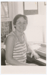 Gittings at typewriter