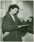 Publicity series: Betty Miller clocking in a few minutes before her shift at the stocking counter