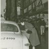 Publicity series: Betty Miller getting into a taxi after work