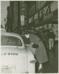 Publicity series: Betty Miller getting into a taxi after work
