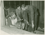 Ted Mann (middle) with unidentified contractors or construction workers working at The Academy of Music in Philadelphia