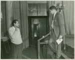 José Quintero and unidentified man near stage at The Academy of Music in Philadelphia