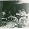 Snapshot of unidentified individuals studying scripts in Woodstock, NY