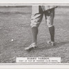 Harry Vardon. Feet at top of wooden club swing.