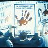 The Government Has Blood on Its Hands (Protesters holding multiple copies of this placard)