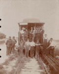 Photograph of first multiple unit test car with workers, 1897 July 16