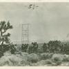 The wires seen in this picture carry power two hundred and fifty miles the power is generated by waterfalls in the distant mountains and transmitted for consumption by the people of Los Angeles