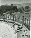 Sunbathers poolside