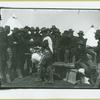 Soldier getting face shaven at Camp Black, Long Island, New York
