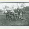 Men loading a cannon at Camp Townsend, New York