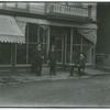 Three men standing in from of store in Garrison, NY