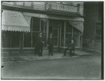 Three men standing in from of store in Garrison, NY