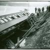 Overturned train car with broken windows