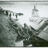 Overturned train car with broken windows