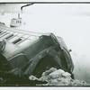 Overturned train car with broken windows