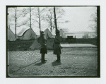 Two soldiers holding rifles facing each other, Camp Black, Long Island, New York