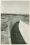 View of the conduit in the desert, line and ready for cover