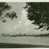 Distant view of Oakland business district across Lake Merritt