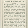 Leading a horse on the road.