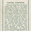 Laying linoleum.