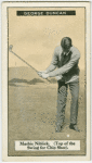 George Duncan: mashie niblick (top of swing for a chip shot).