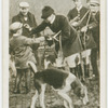 "Blooding" a youngster. Bicester Foxhounds at Everly Village.