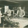 The "rattatorium" where tagged rodents are skinned preparatory to microscopic examination for infection. These men can individually skin upwards of 500 rats a day.