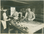 The "rattatorium" where tagged rodents are skinned preparatory to microscopic examination for infection. These men can individually skin upwards of 500 rats a day.