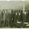 Lincoln Evening School, Principal A.H. MacDonald receiving applicants for addmission to the school.