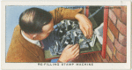 Refilling stsamp machine.