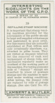 Refilling stsamp machine.