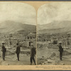 Ash-covered ruins of St. Pierre, and Mont Pelée, with its great ascending cloud of Steam. Martinique, W. I.