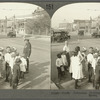 Traffic Policeman Helping Children to Cross the Street