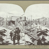The principal street, where most of the people were killed by falling buildings, showing the ruins