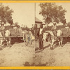 Man and children with ox-pulled wagon