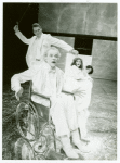 James Cahill (foreground), Christopher Reeve (background), Mary Elizabeth Mastrantonio (seated), and Caitlin Clarke (seated) in the stage production The Marriage of Figaro